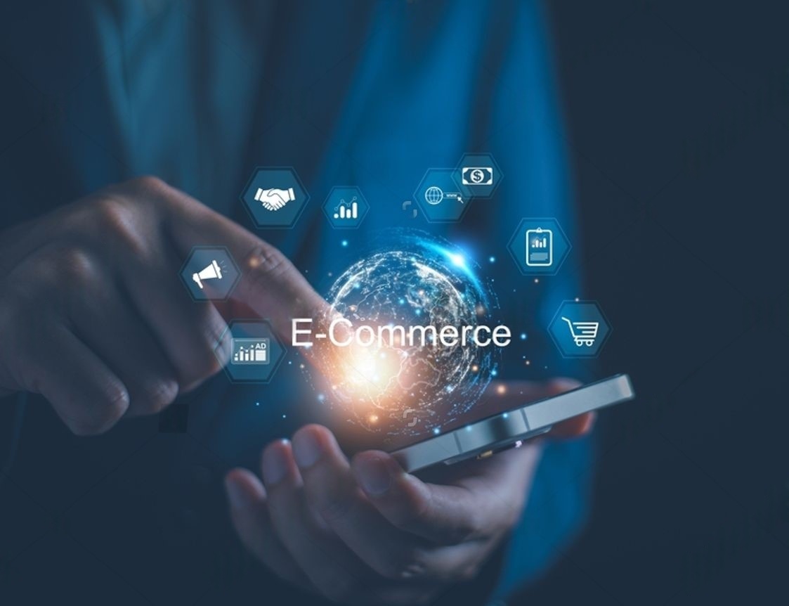 Illustration of e-commerce, highlighting a shopping cart, smartphones, and icons representing online shopping transactions.